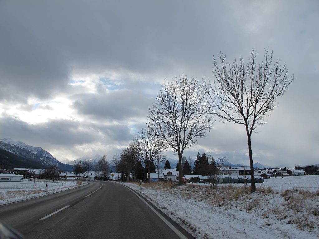 With mountainous backdrop.