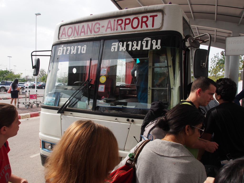Shuttle bus at the entrance of airport.