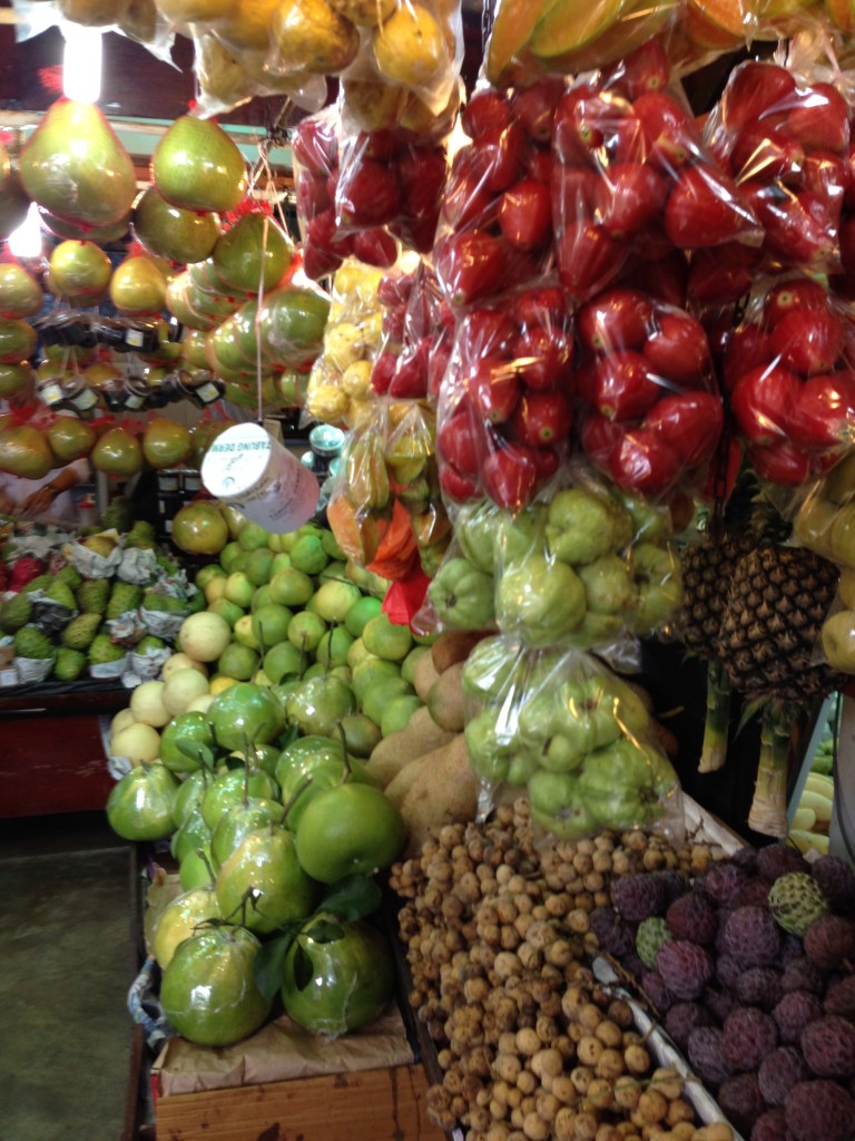 Bags of fruits hanging for sale
