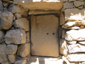 Heavy stone door.