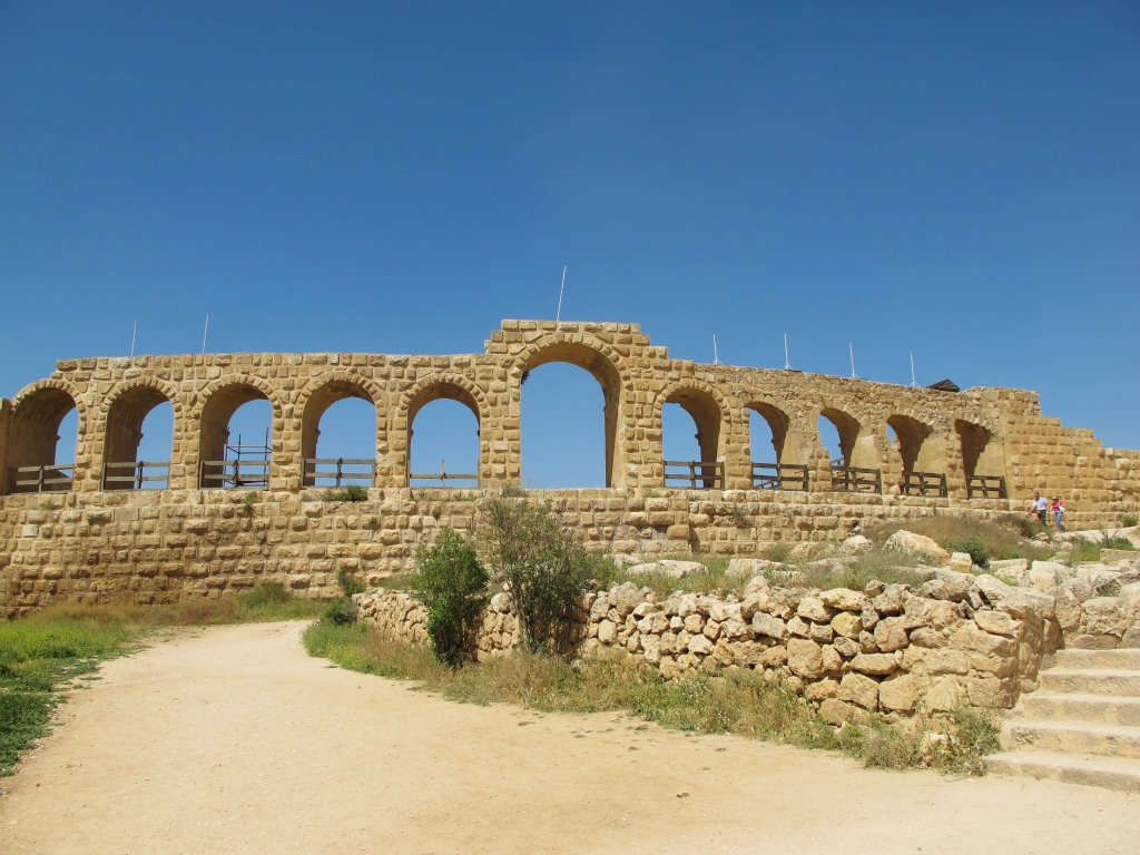 Stone structure surrounding the race track.