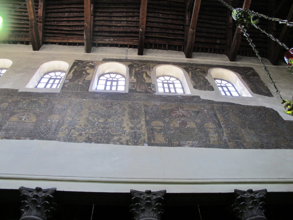 Mosaic filled walls within the church.