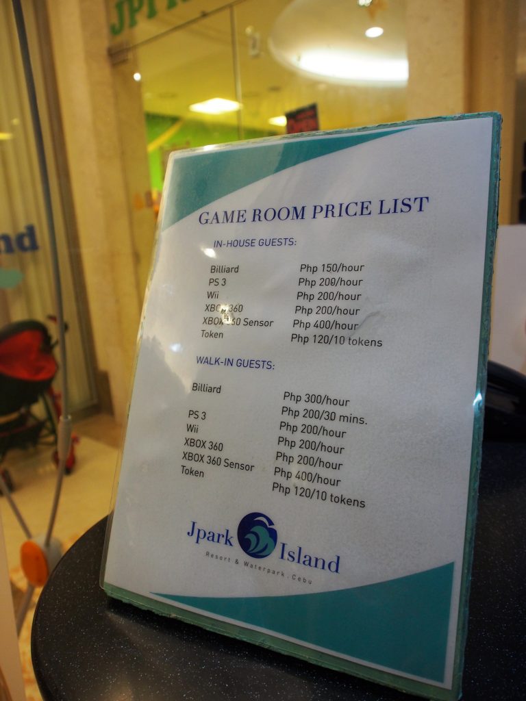 Price list at the games arcade.